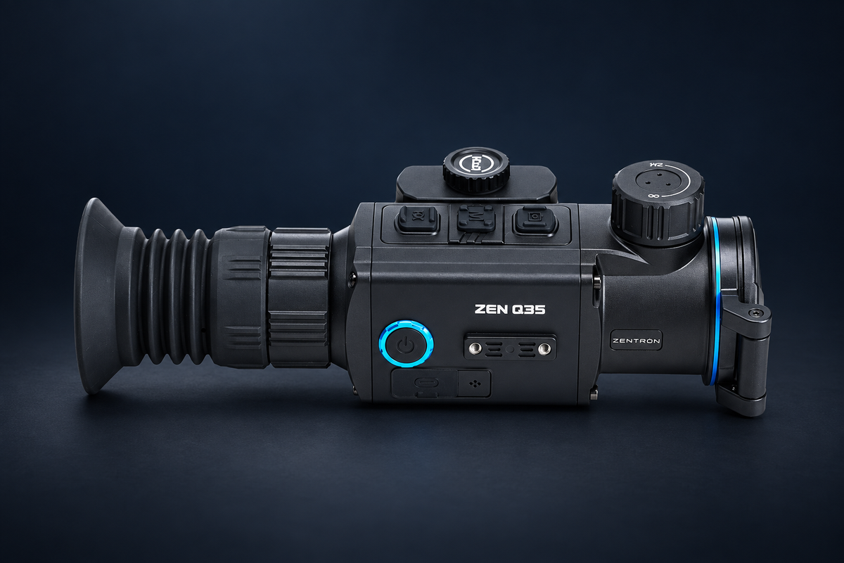 ZEN Q35 thermal optic in a dark studio, with the complete device visible